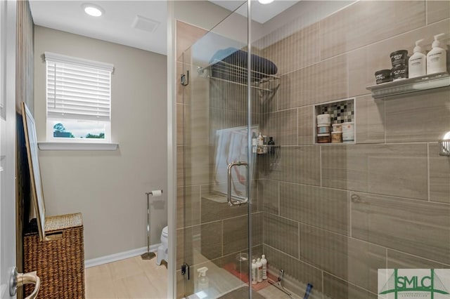 21 Shoefstall St, Savannah, GA 31407 - bathroom featuring baseboards, a stall shower, and toilet