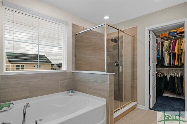 21 Shoefstall St, Savannah, GA 31407 - bathroom featuring a walk in closet, a bath, and a shower stall