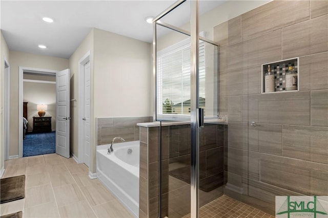 21 Shoefstall St, Savannah, GA 31407 - ensuite bathroom with a bath, a stall shower, tile patterned floors, ensuite bathroom, and recessed lighting