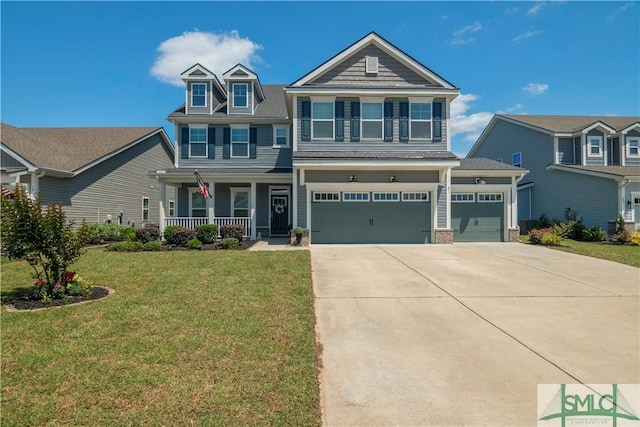 21 Shoefstall St, Savannah, GA 31407 - craftsman-style house featuring covered porch, an attached garage, driveway, and a front lawn