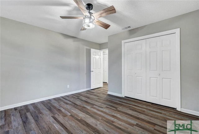 4 Quail Trl, Savannah, GA 31406 - unfurnished bedroom with visible vents, baseboards, wood finished floors, and a closet