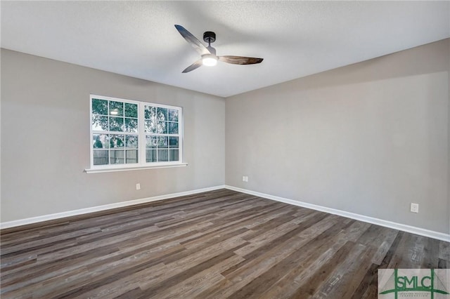 4 Quail Trl, Savannah, GA 31406 - spare room featuring baseboards, a ceiling fan, dark wood-style floors, and a textured ceiling