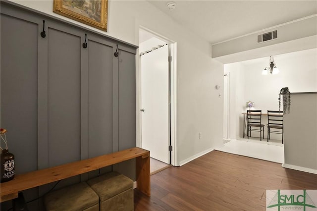 401 N Cromwell Rd Unit P-5, Savannah, GA 31410 - mudroom featuring visible vents, baseboards, and dark wood-style floors