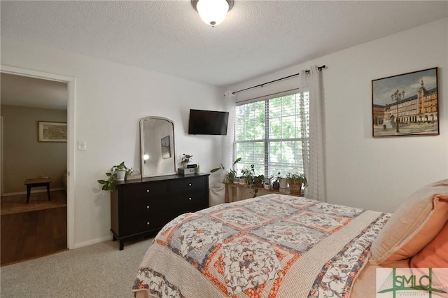 401 N Cromwell Rd Unit P-5, Savannah, GA 31410 - bedroom with carpet flooring and a textured ceiling