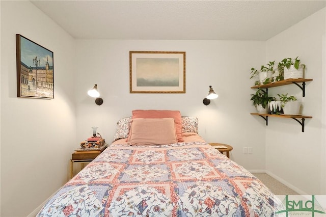 401 N Cromwell Rd Unit P-5, Savannah, GA 31410 - carpeted bedroom featuring baseboards