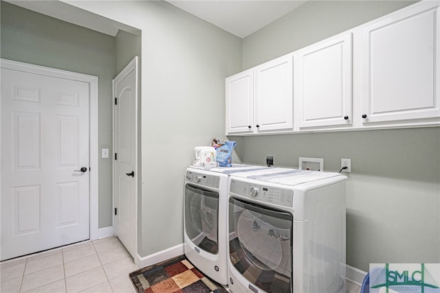 23 Olde Gate Ct, Pooler, GA 31322 - clothes washing area with light tile patterned floors, baseboards, cabinet space, and washer and clothes dryer