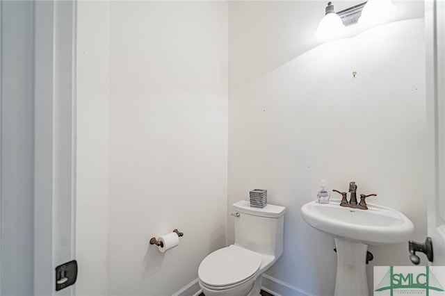 23 Olde Gate Ct, Pooler, GA 31322 - bathroom with toilet and baseboards