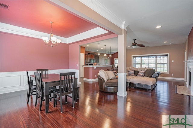 23 Olde Gate Ct, Pooler, GA 31322 - dining space featuring a fireplace, ceiling fan with notable chandelier, recessed lighting, visible vents, and dark wood-style floors