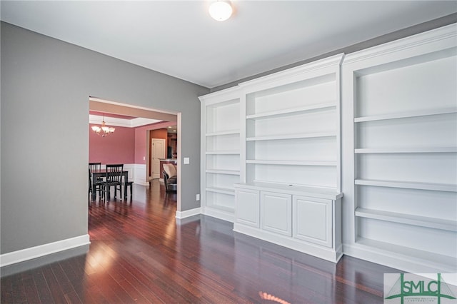 23 Olde Gate Ct, Pooler, GA 31322 - unfurnished dining area with a chandelier, dark wood-type flooring, and baseboards