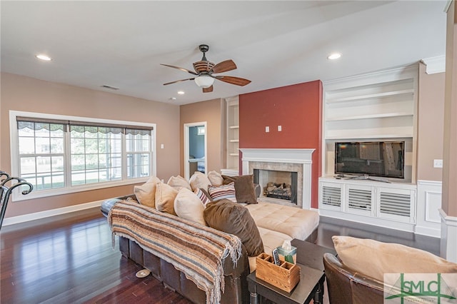 23 Olde Gate Ct, Pooler, GA 31322 - living area with built in features, ceiling fan, dark wood-style floors, baseboards, and a premium fireplace