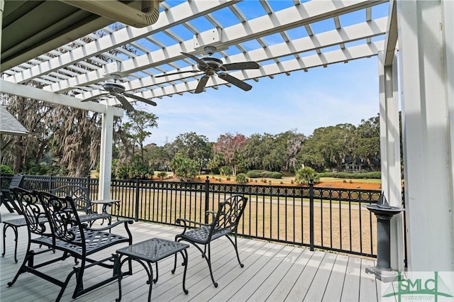 deck featuring a yard, a pergola, and a ceiling fan