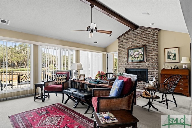 sunroom with beam ceiling and visible vents
