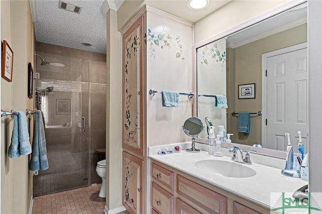 full bath with vanity, a stall shower, toilet, and visible vents