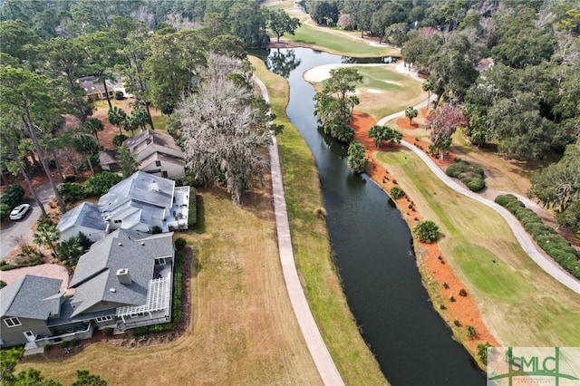 bird's eye view with a water view and view of golf course
