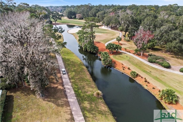 bird's eye view featuring a water view and view of golf course