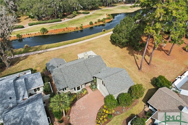 aerial view with a water view and view of golf course