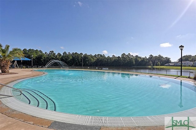 pool featuring fence
