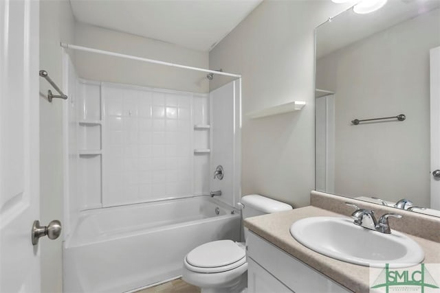 full bathroom with vanity, shower / tub combination, and toilet