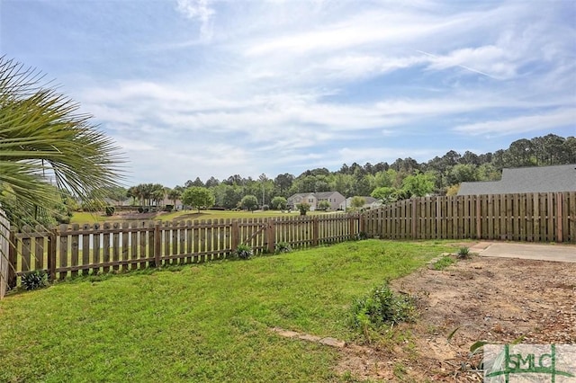 view of yard featuring a fenced backyard
