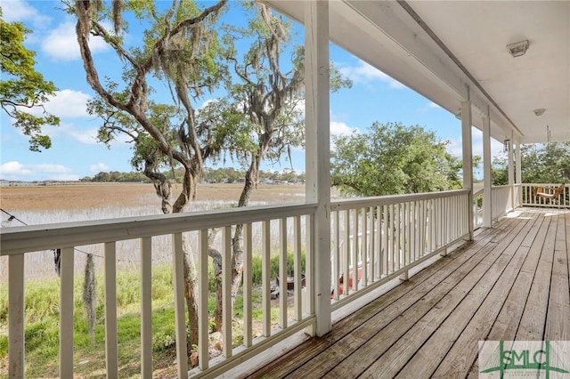 deck featuring a water view