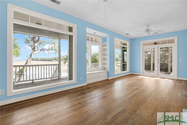 interior space with visible vents and french doors