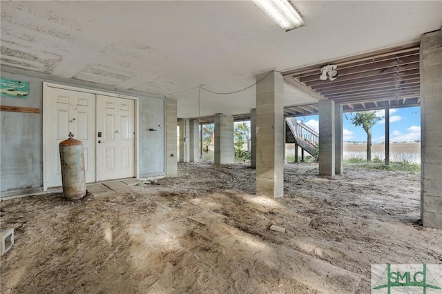 interior space featuring a water view