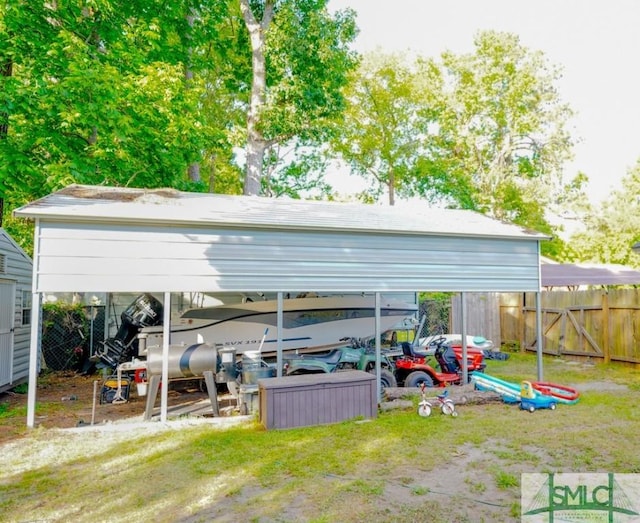 368 Piercefield Dr, Richmond Hill, GA 31324 - exterior space featuring fence and a carport