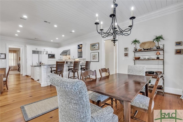 dining area featuring wooden ceiling, ornamental molding, visible vents, and a notable chandelier