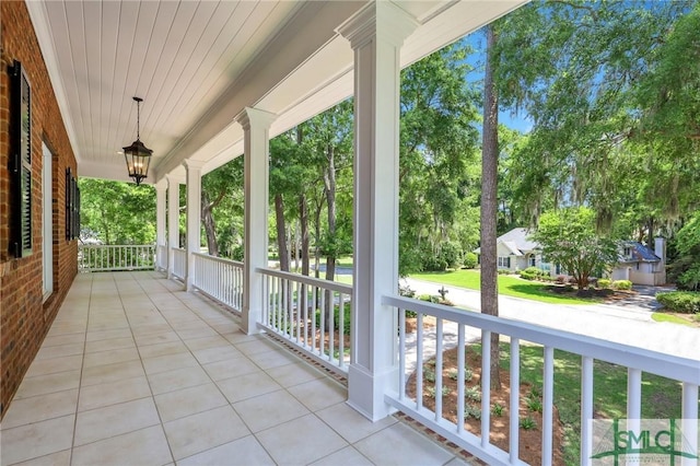 balcony featuring a porch