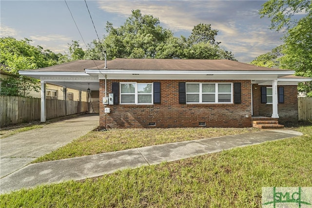 2115 Gable St, Savannah, GA 31404 - single story home with crawl space, fence, a front lawn, concrete driveway, and an attached carport