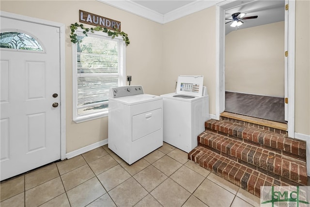 2115 Gable St, Savannah, GA 31404 - laundry area featuring crown molding, baseboards, ceiling fan, washer and clothes dryer, and light tile patterned floors