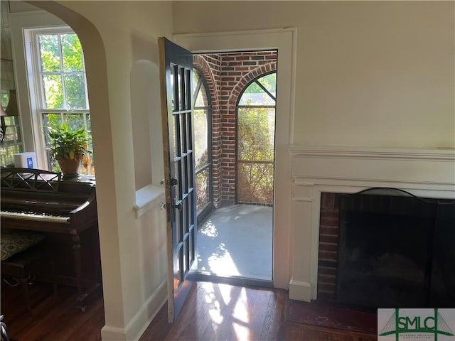 1901 E Anderson St E, Savannah, GA 31404 - doorway with arched walkways, wood finished floors, and a wealth of natural light