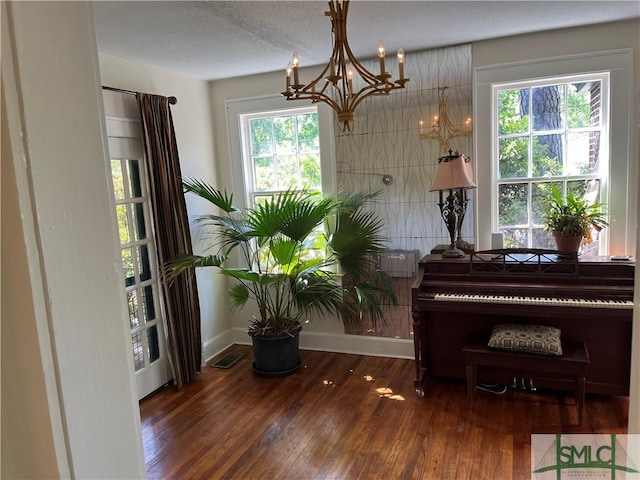 1901 E Anderson St E, Savannah, GA 31404 - sitting room with visible vents, wood-type flooring, baseboards, and a chandelier