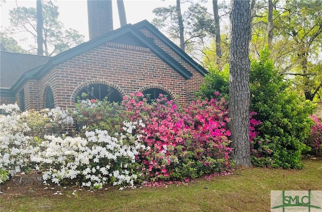 1901 E Anderson St E, Savannah, GA 31404 - view of side of property with brick siding and a chimney