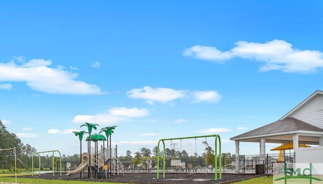 community jungle gym featuring fence