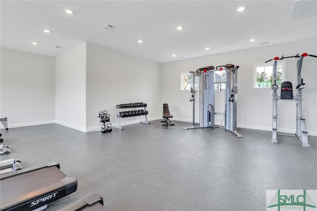 exercise room featuring baseboards, recessed lighting, and visible vents