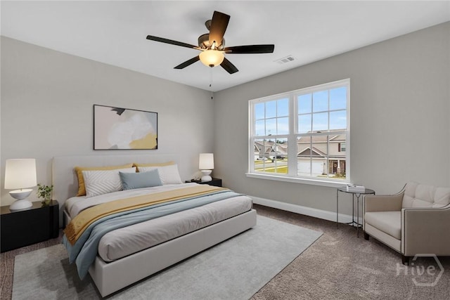 161 Guana Ln, Bloomingdale, GA 31302 - bedroom with carpet flooring, baseboards, and ceiling fan