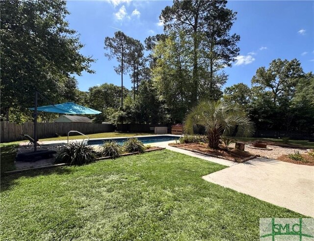 204 Archibald St, Rincon, GA 31326 - view of yard with a patio