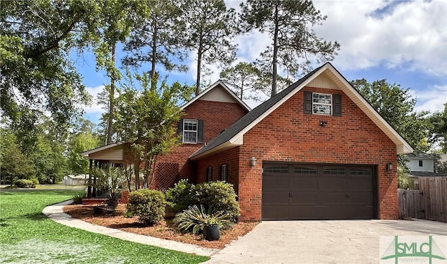 204 Archibald St, Rincon, GA 31326 - view of front of home featuring brick siding, concrete driveway, and a garage