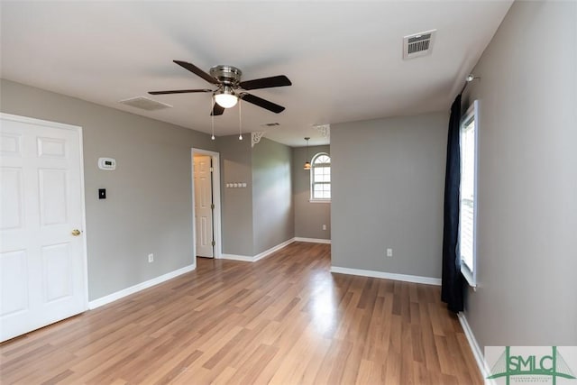 204 Archibald St, Rincon, GA 31326 - empty room with a ceiling fan, light wood-style floors, and baseboards