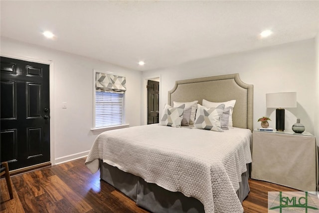bedroom featuring recessed lighting, baseboards, and dark wood finished floors