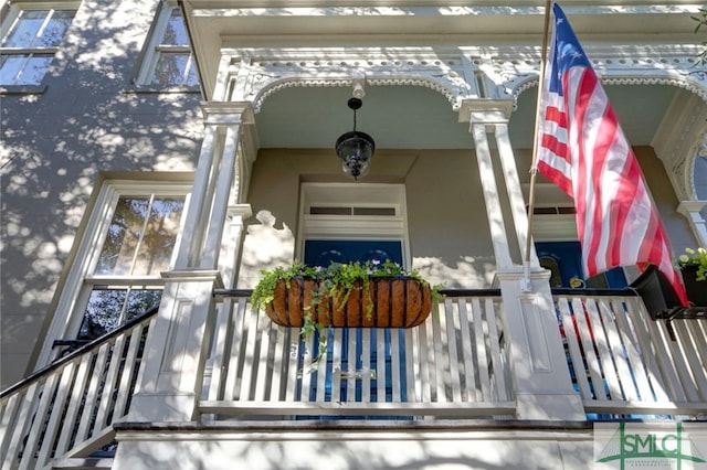 entrance to property featuring covered porch