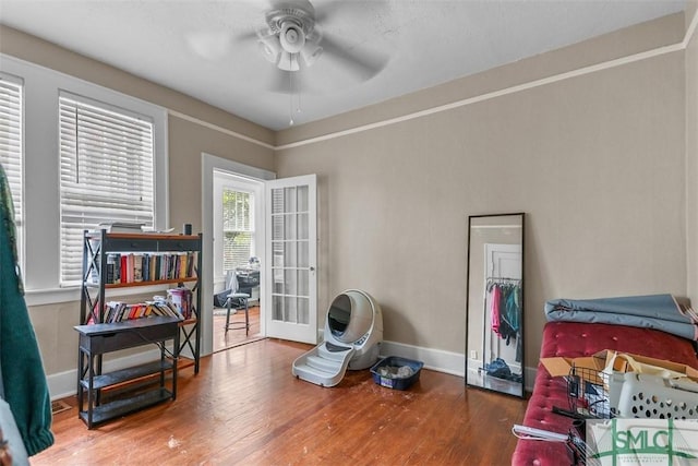 724 E 49th St, Savannah, GA 31405 - miscellaneous room featuring baseboards, ceiling fan, and wood finished floors