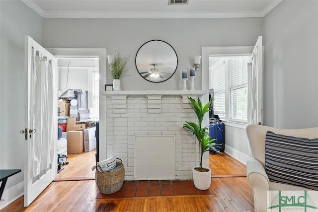 724 E 49th St, Savannah, GA 31405 - details featuring a ceiling fan, visible vents, wood finished floors, baseboards, and ornamental molding