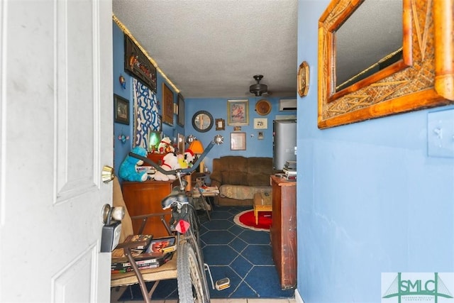 724 E 49th St, Savannah, GA 31405 - interior space with tile patterned floors, a ceiling fan, and a textured ceiling