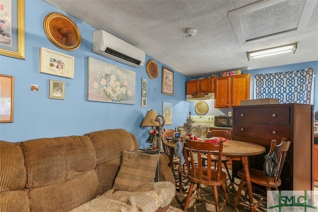724 E 49th St, Savannah, GA 31405 - interior space featuring a textured ceiling, a wall unit AC, and attic access