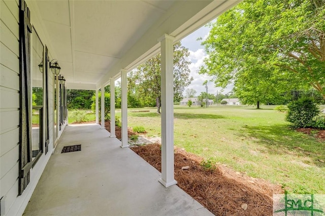 view of patio featuring a porch