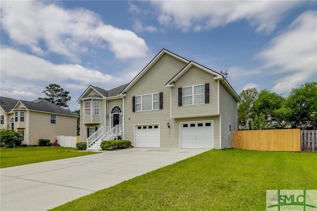 133 Ridgewood Cir, Rincon, GA 31326 - bi-level home with fence, an attached garage, driveway, and a front yard