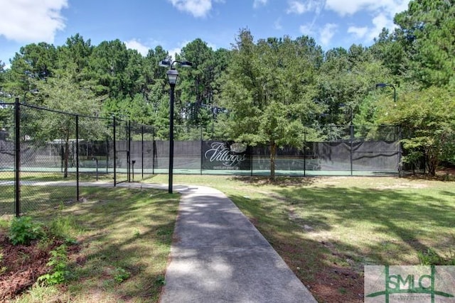 169 Nandina Way, Pooler, GA 31322 - exterior space with a lawn, a tennis court, and fence
