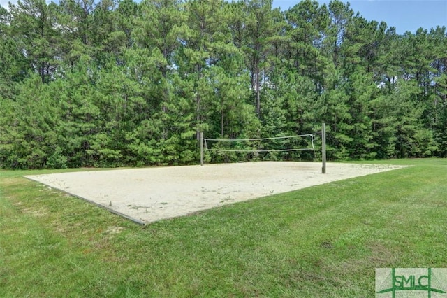 169 Nandina Way, Pooler, GA 31322 - view of property's community with a lawn, a wooded view, and volleyball court